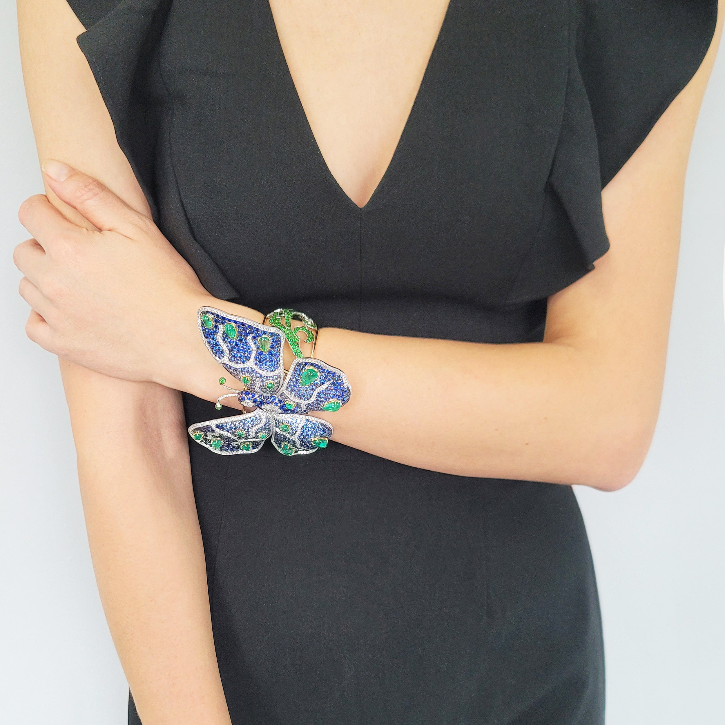 De Grisogono diamond and gemstone butterfly bangle in 18k yellow gold.
