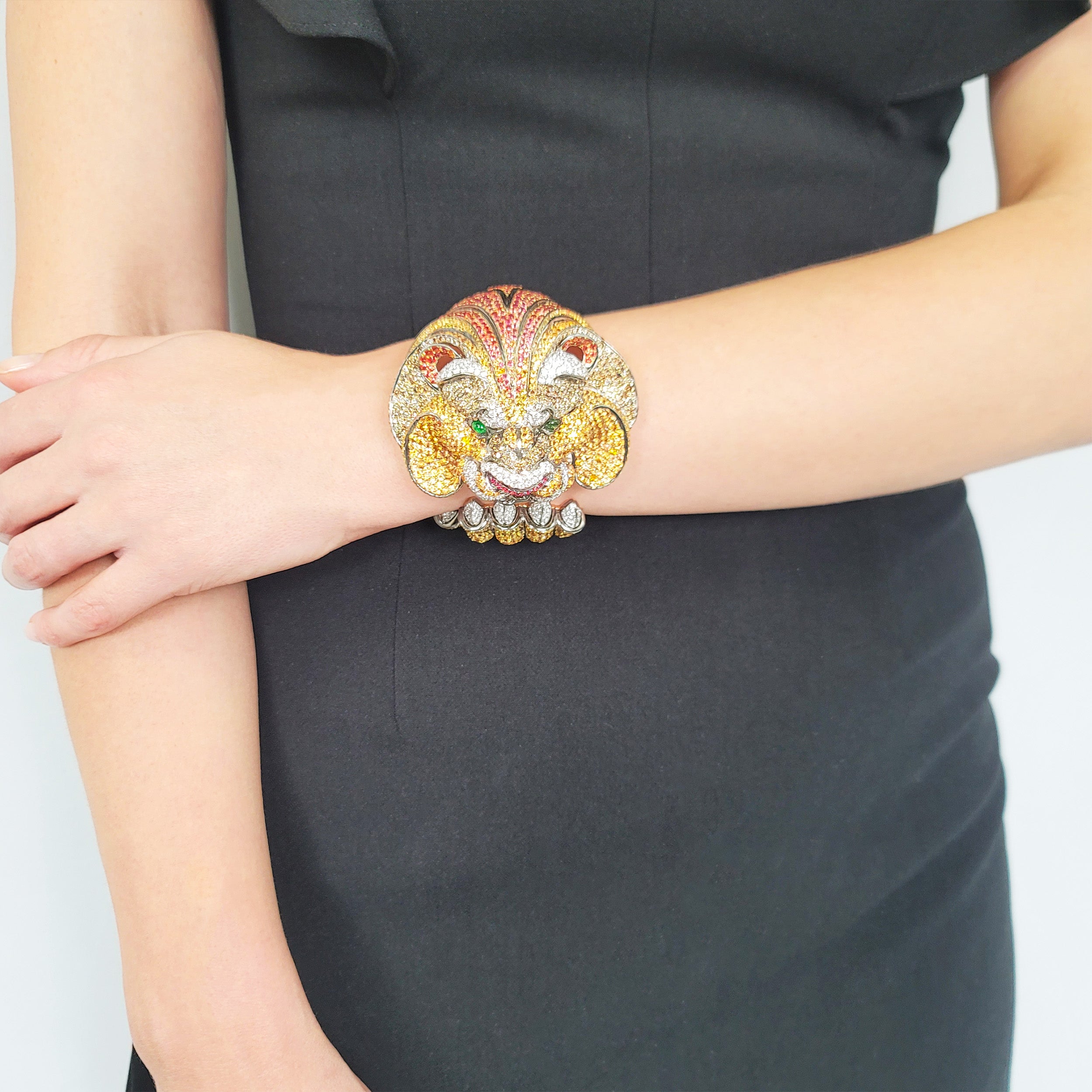 De Grisogono Diamond and gemstone lion cuff bracelet crafted in 18k gold.