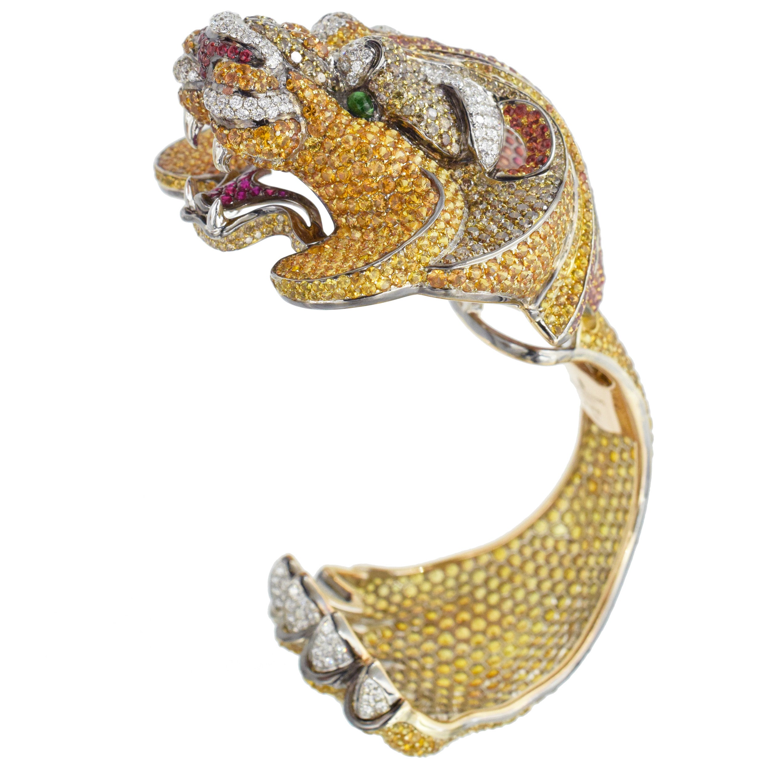 De Grisogono Diamond and gemstone lion cuff bracelet crafted in 18k gold.