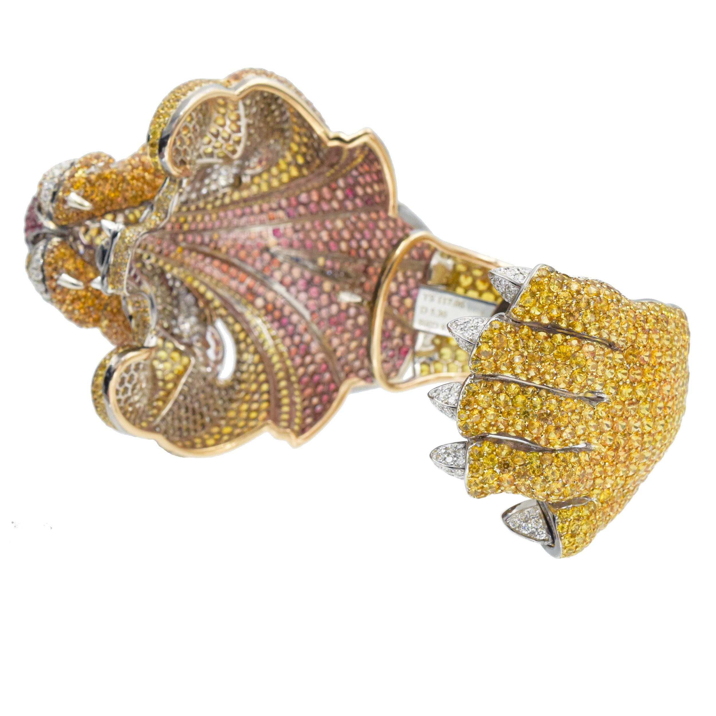 De Grisogono Diamond and gemstone lion cuff bracelet crafted in 18k gold.