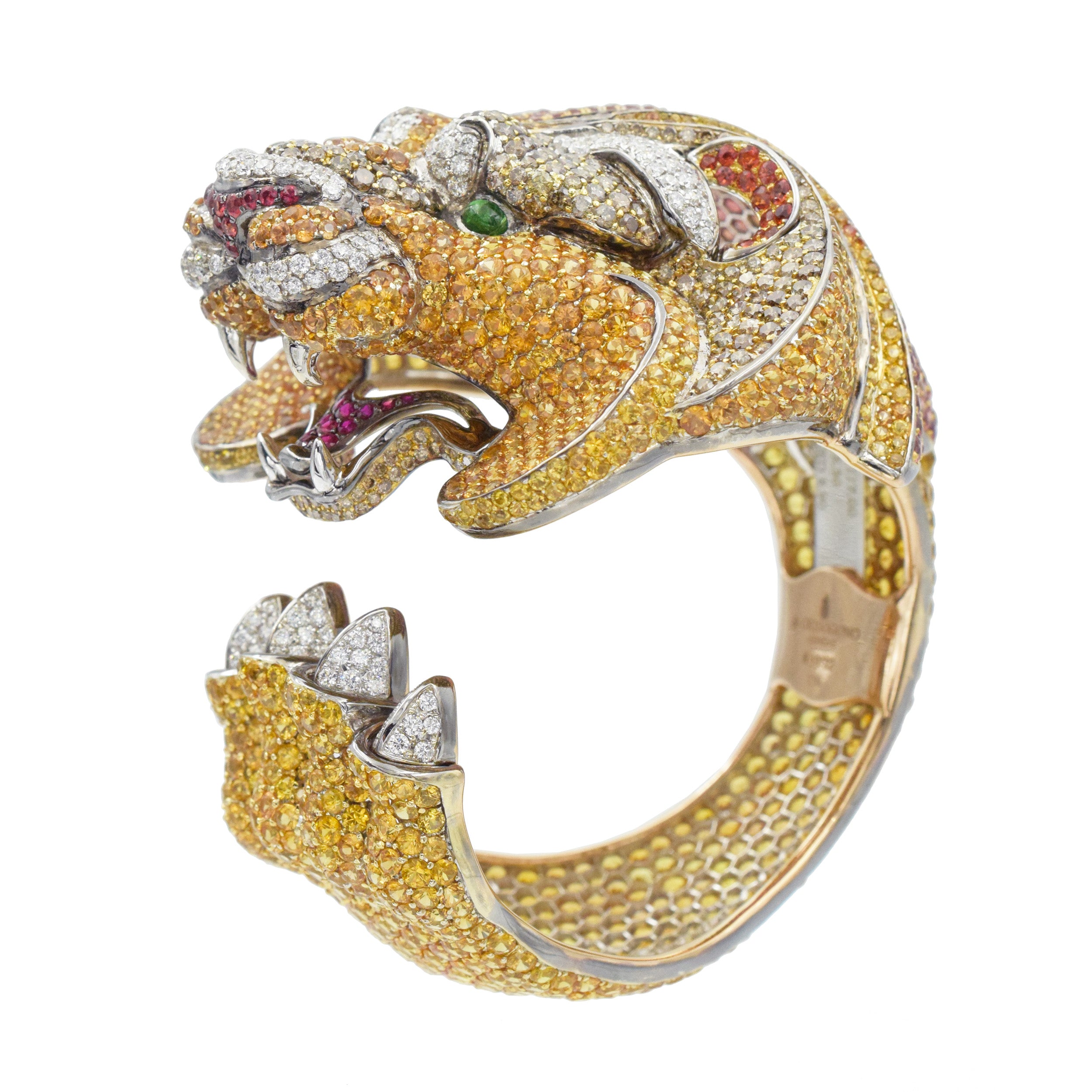 De Grisogono Diamond and gemstone lion cuff bracelet crafted in 18k gold.