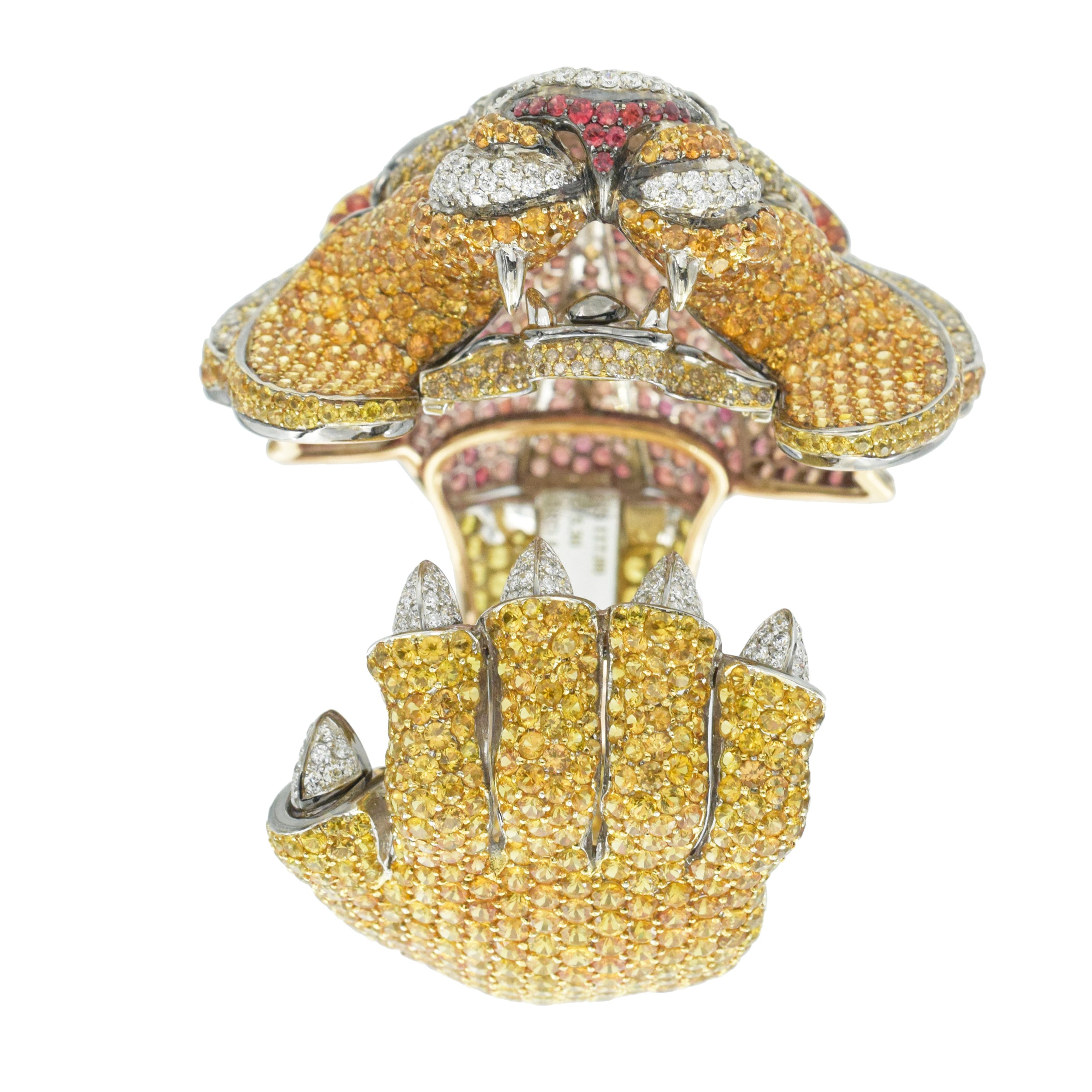 De Grisogono Diamond and gemstone lion cuff bracelet crafted in 18k gold.