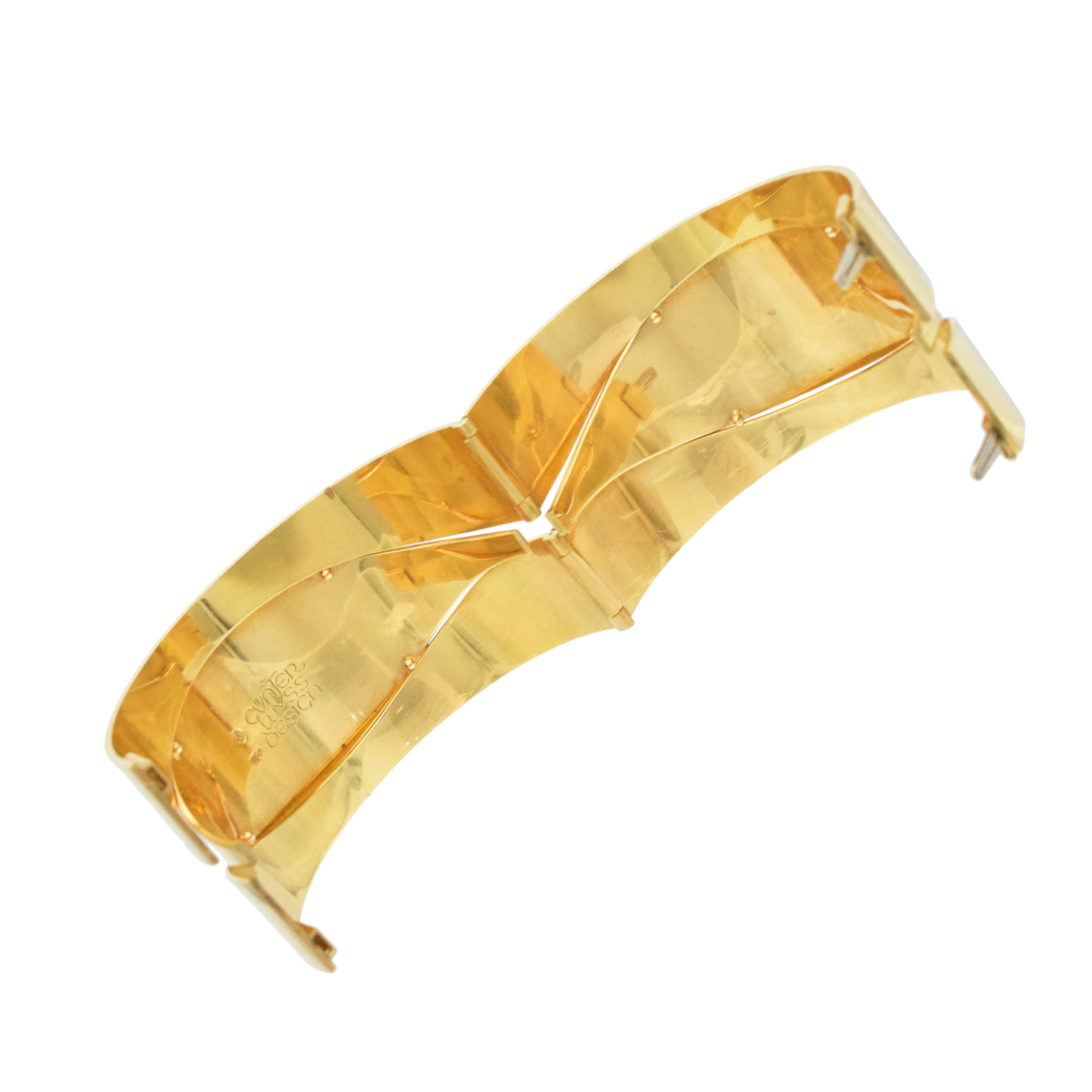 Gunter Wyss 18k yellow gold modernist hinged bangle bracelet