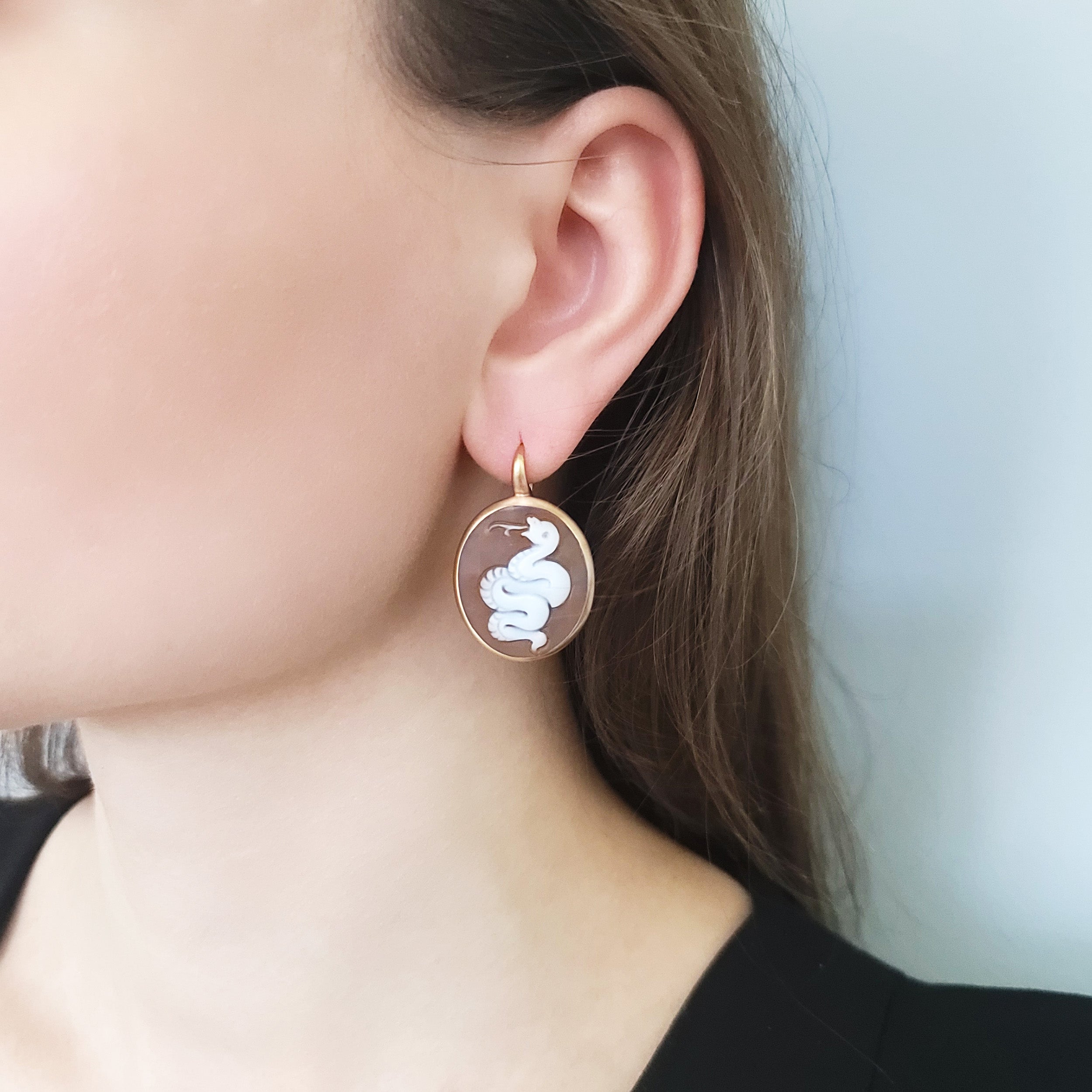 Pomellato Eva Snake Cameo Earrings in 18k rose gold.