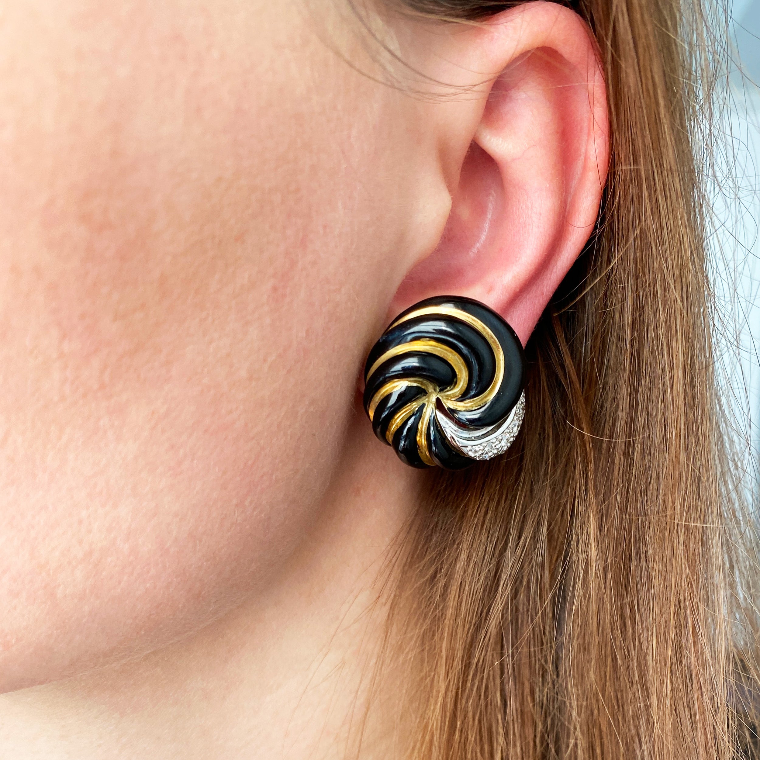 David Webb Black Enamel and Diamond Earclips in 18k Yellow Gold and Platinum.