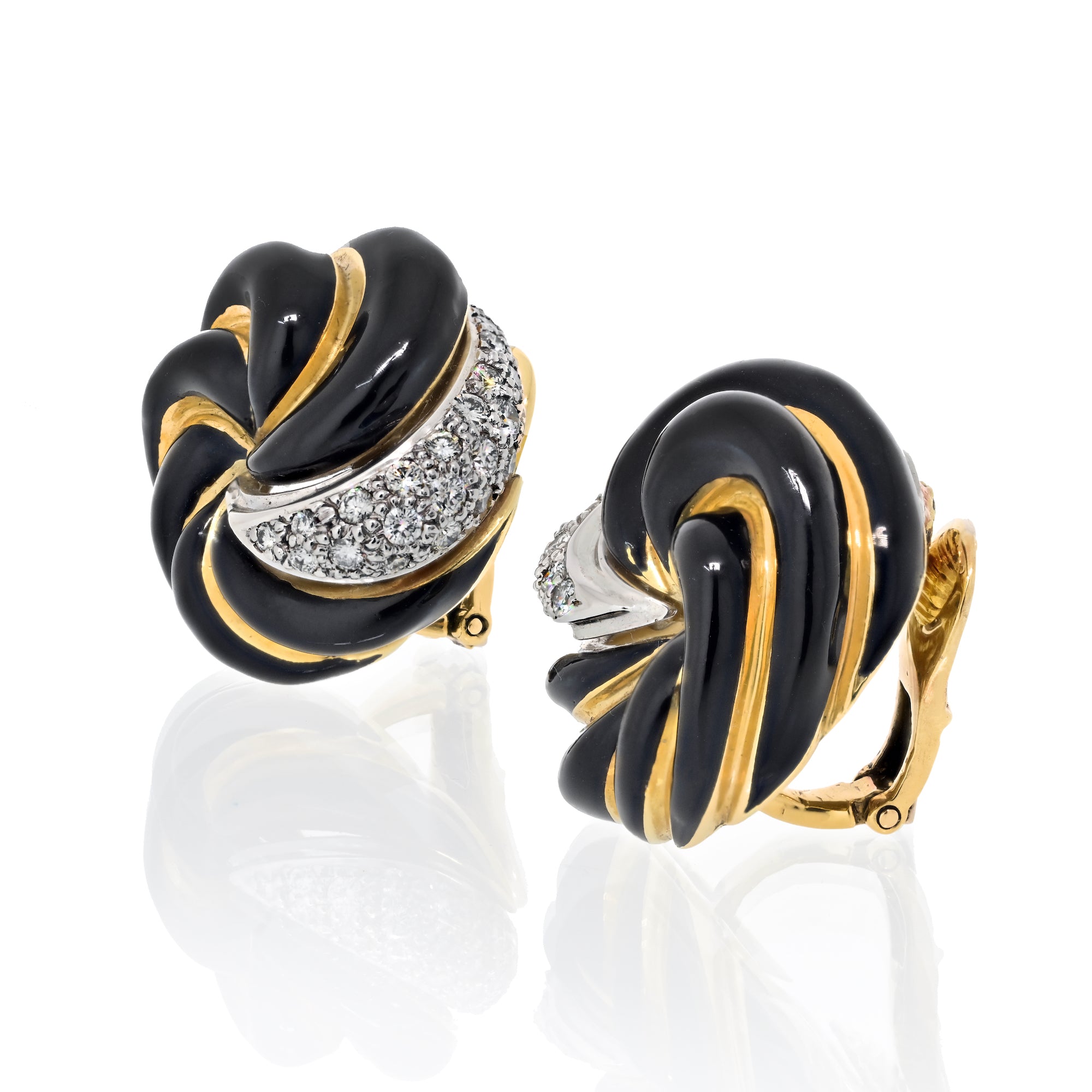 David Webb Black Enamel and Diamond Earclips in 18k Yellow Gold and Platinum.