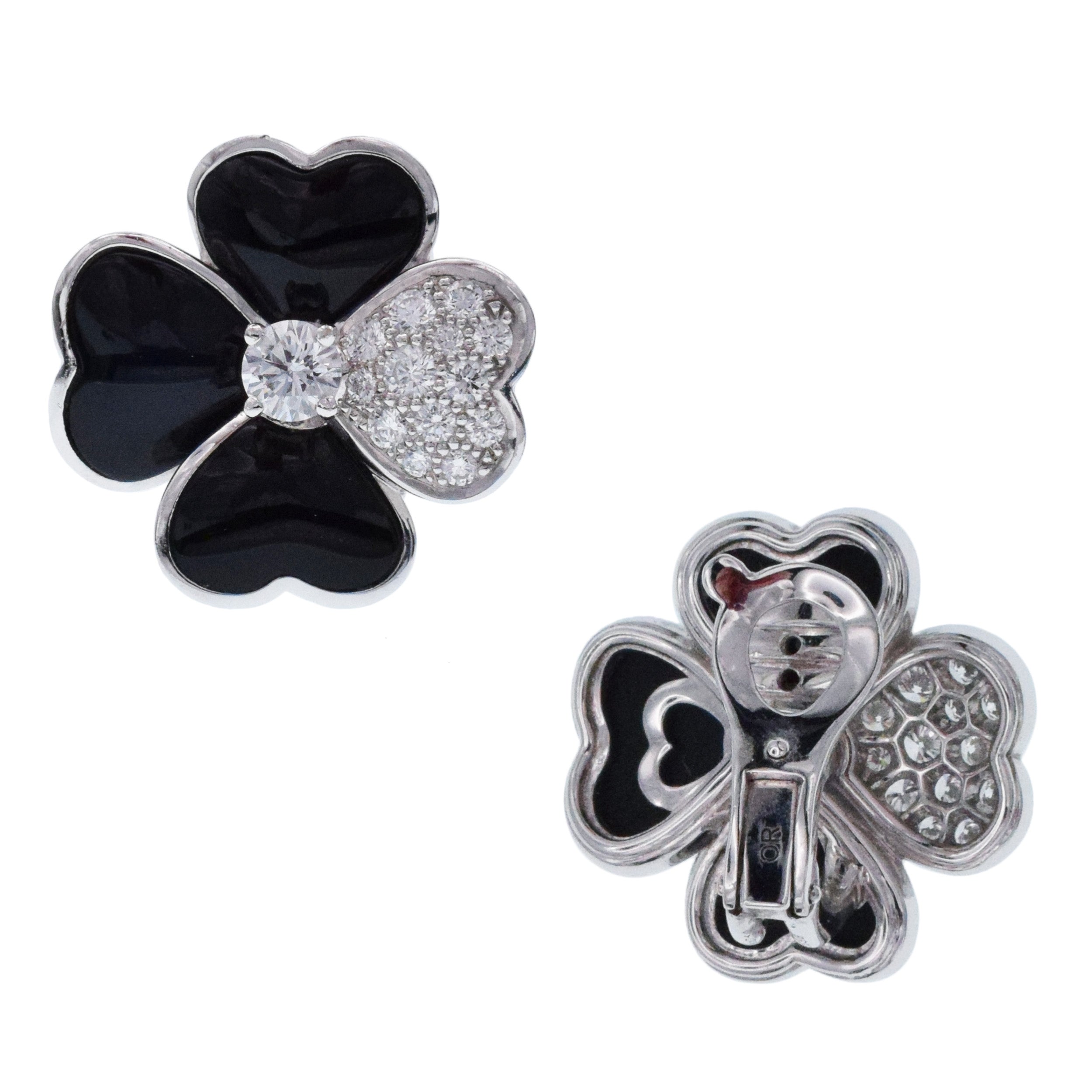 Van Cleef & Arpels Diamond, Onyx, and White Gold 'Cosmos' Clip Earrings