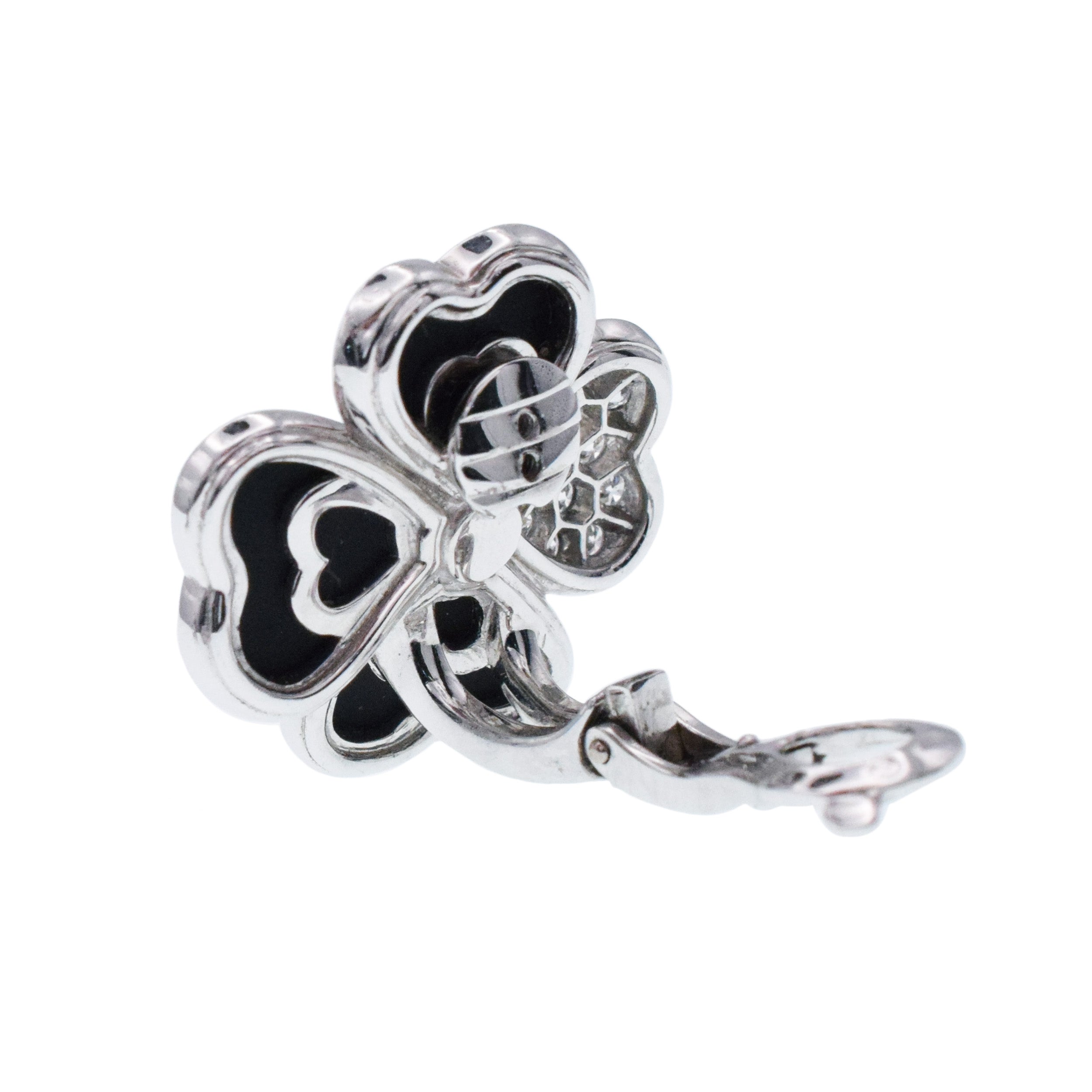 Van Cleef & Arpels Diamond, Onyx, and White Gold 'Cosmos' Clip Earrings