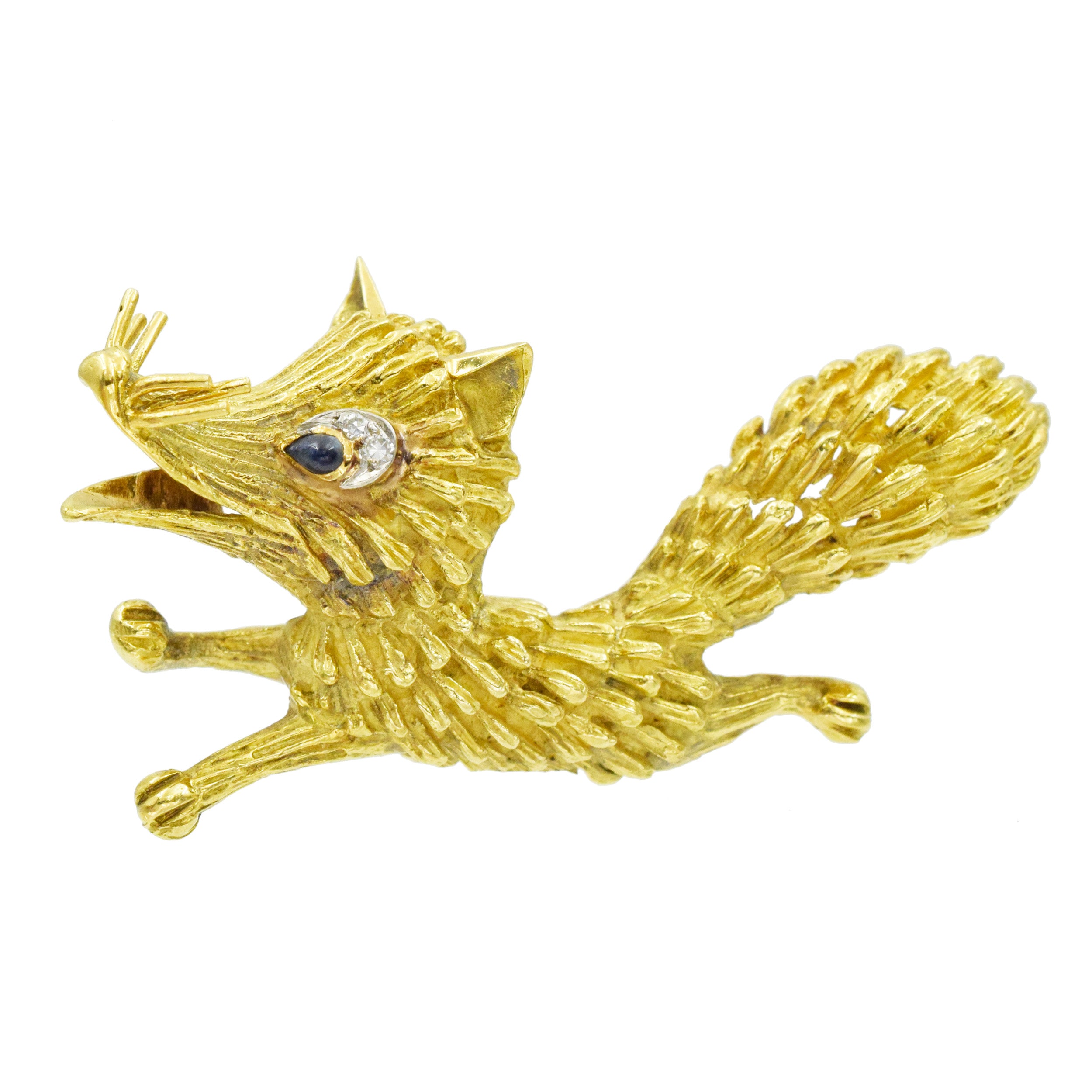 18k Yellow Gold Fox Brooch with Diamond and Sapphire Accents.