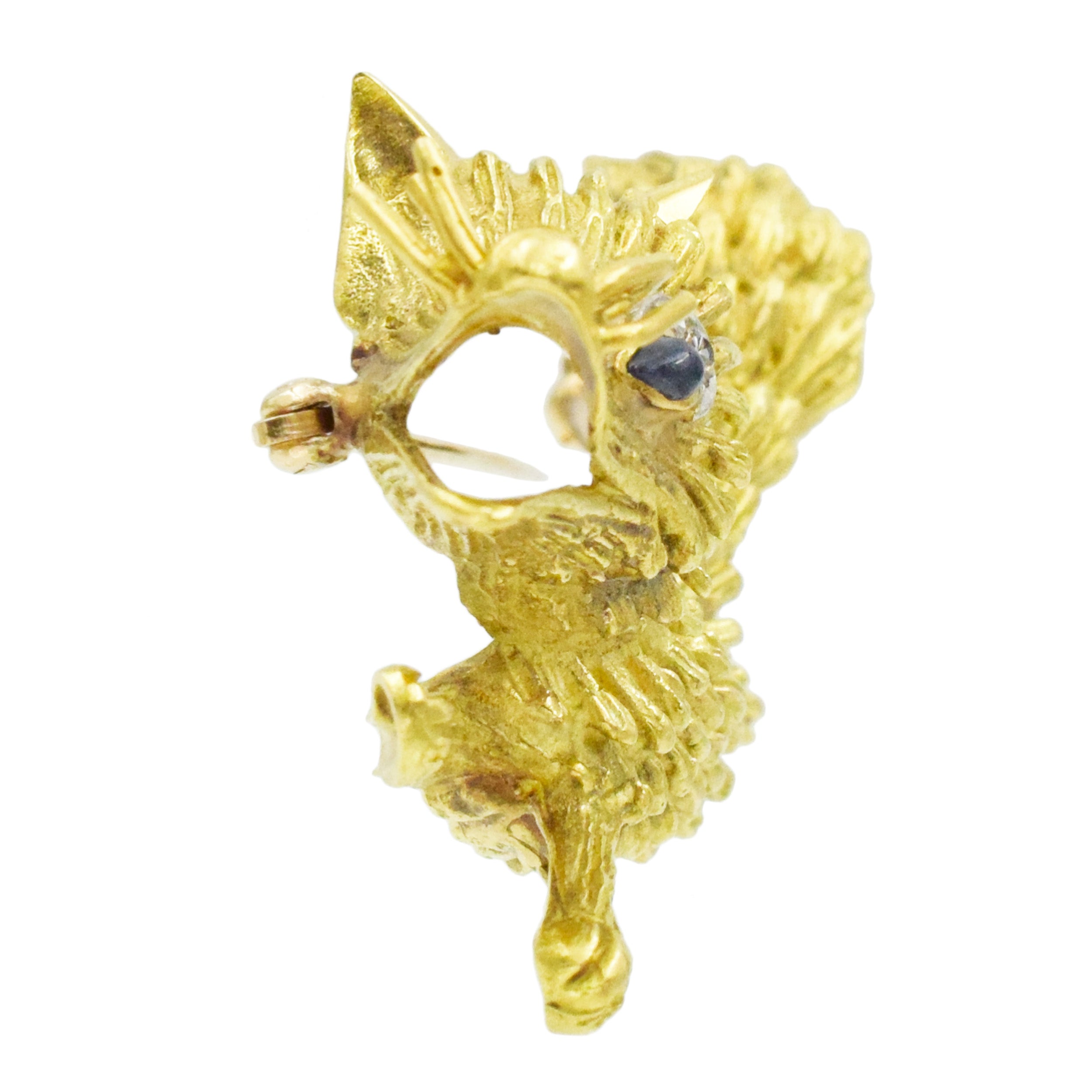 18k Yellow Gold Fox Brooch with Diamond and Sapphire Accents.