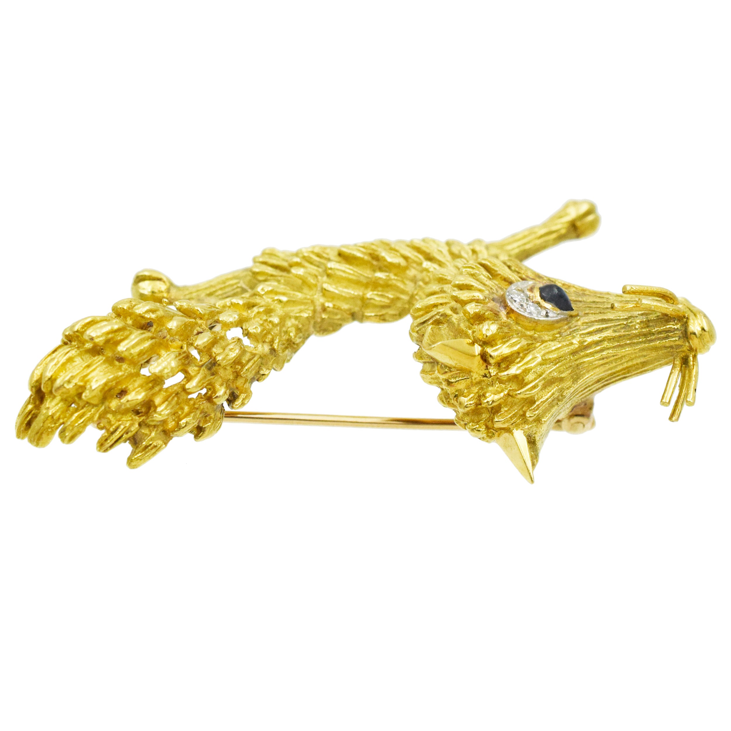 18k Yellow Gold Fox Brooch with Diamond and Sapphire Accents.