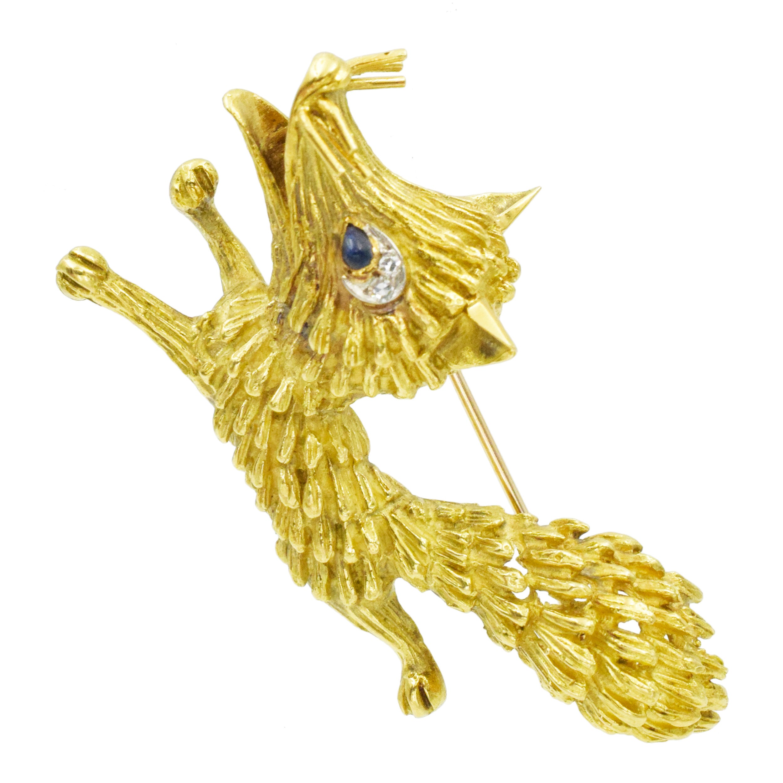 18k Yellow Gold Fox Brooch with Diamond and Sapphire Accents.