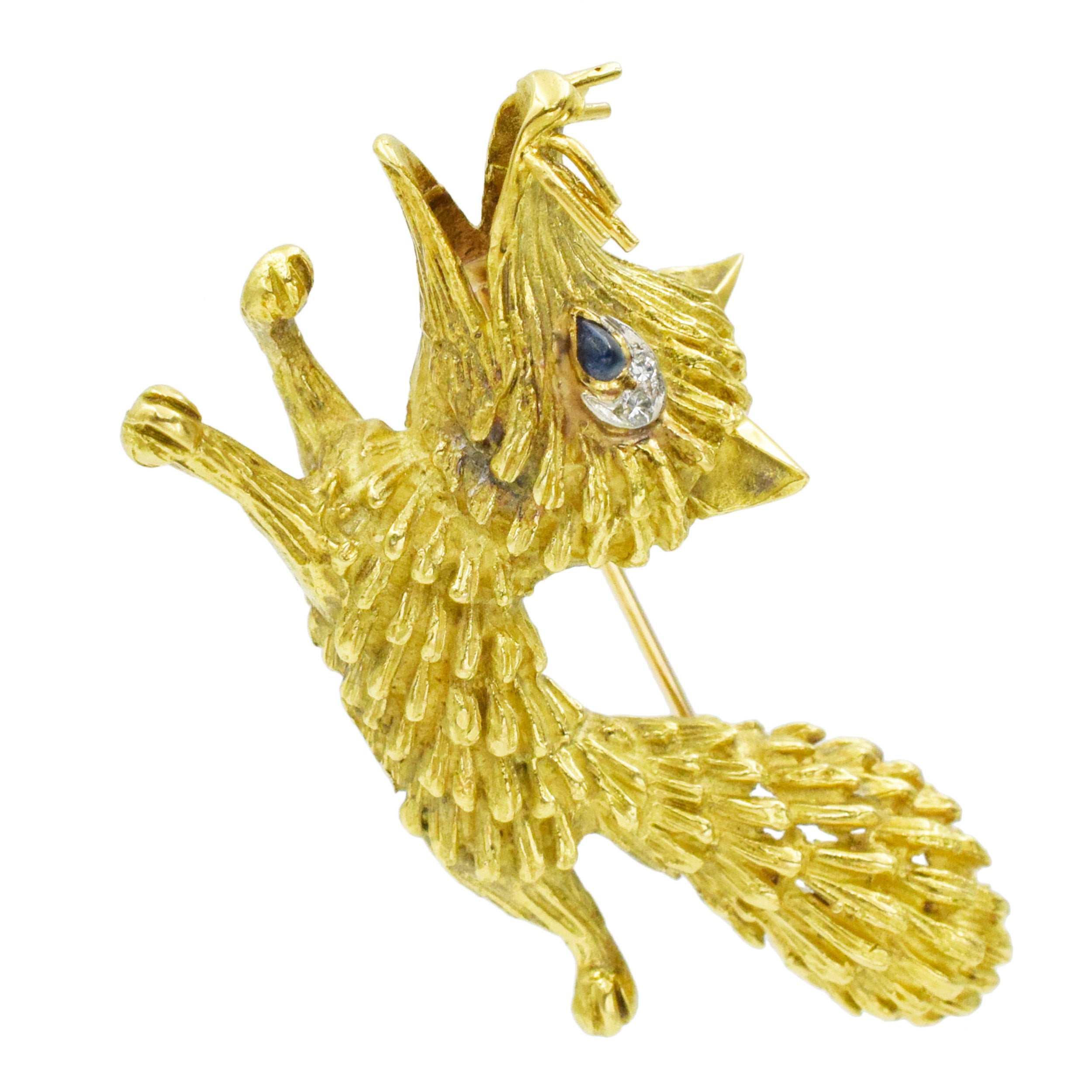 18k Yellow Gold Fox Brooch with Diamond and Sapphire Accents.
