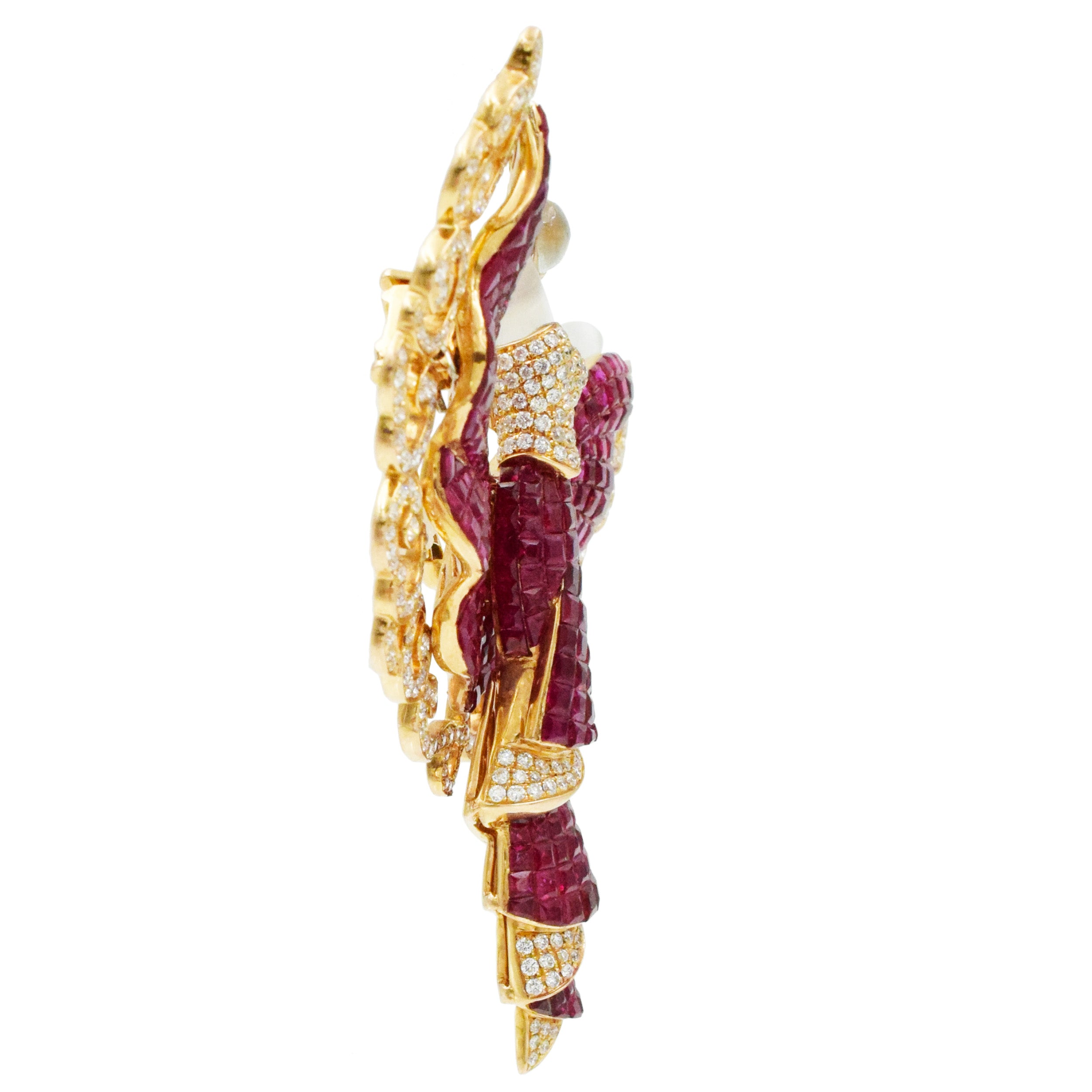 Invisibly set ruby, diamond and crystal brooch in 18k yellow gold.