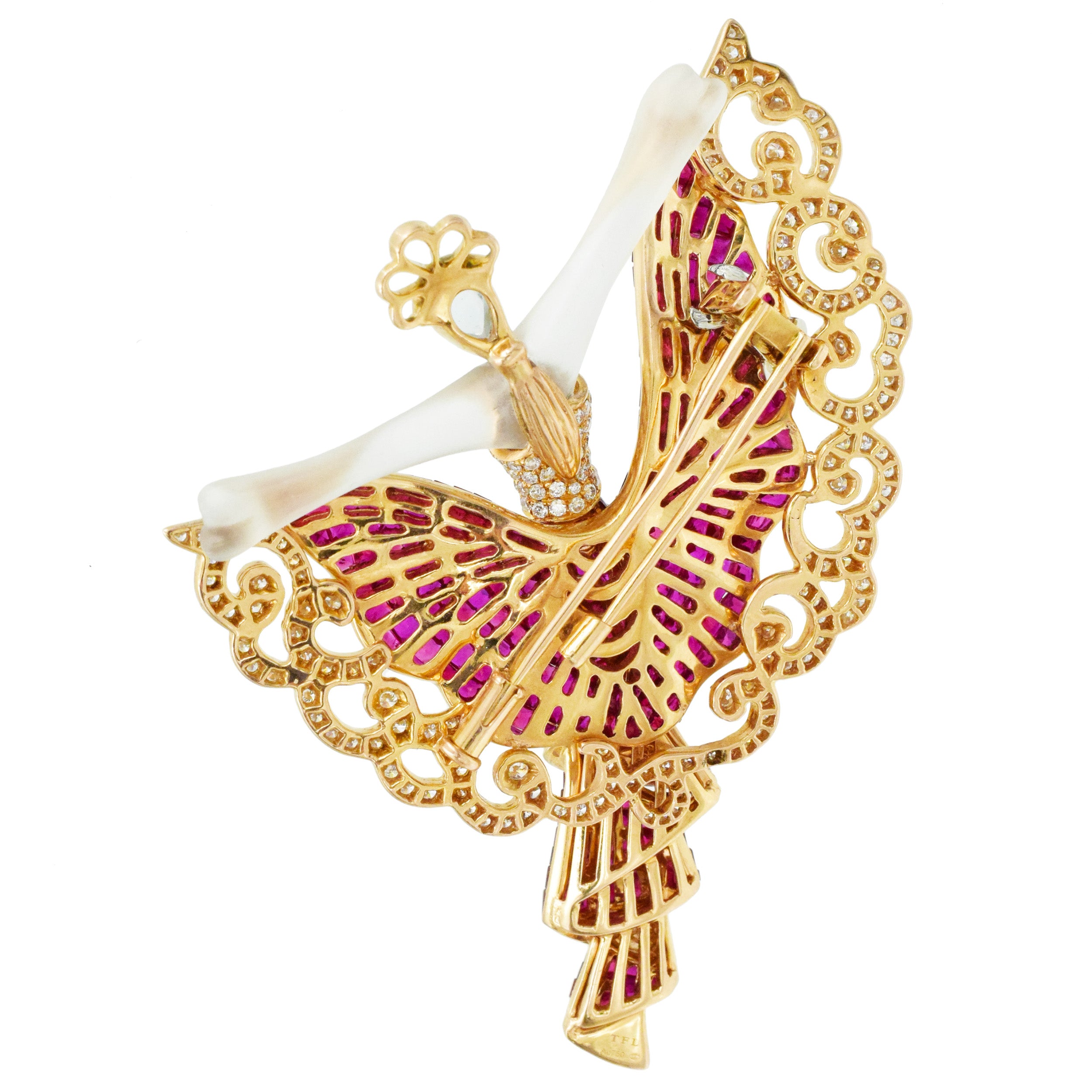 Invisibly set ruby, diamond and crystal brooch in 18k yellow gold.