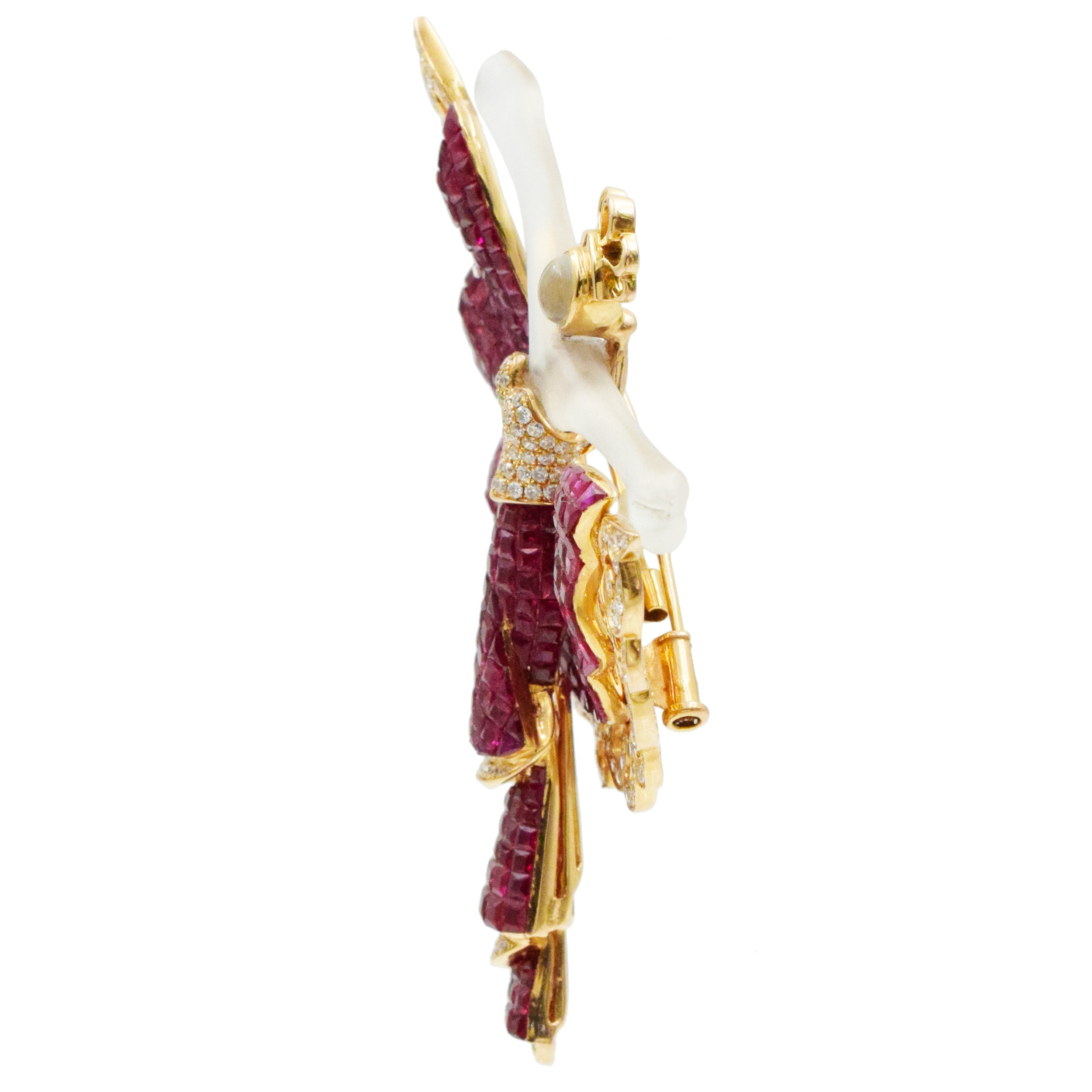 Invisibly set ruby, diamond and crystal brooch in 18k yellow gold.