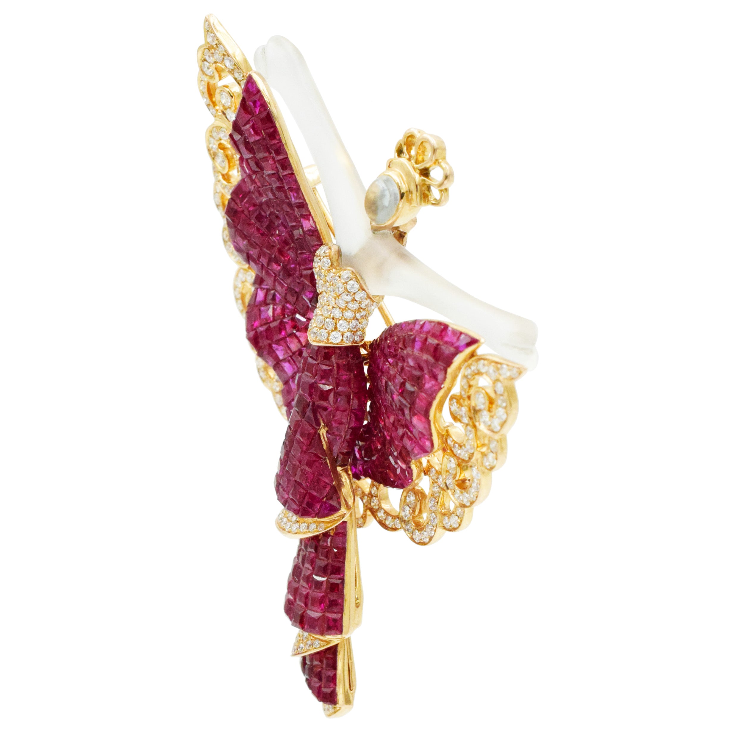 Invisibly set ruby, diamond and crystal brooch in 18k yellow gold.