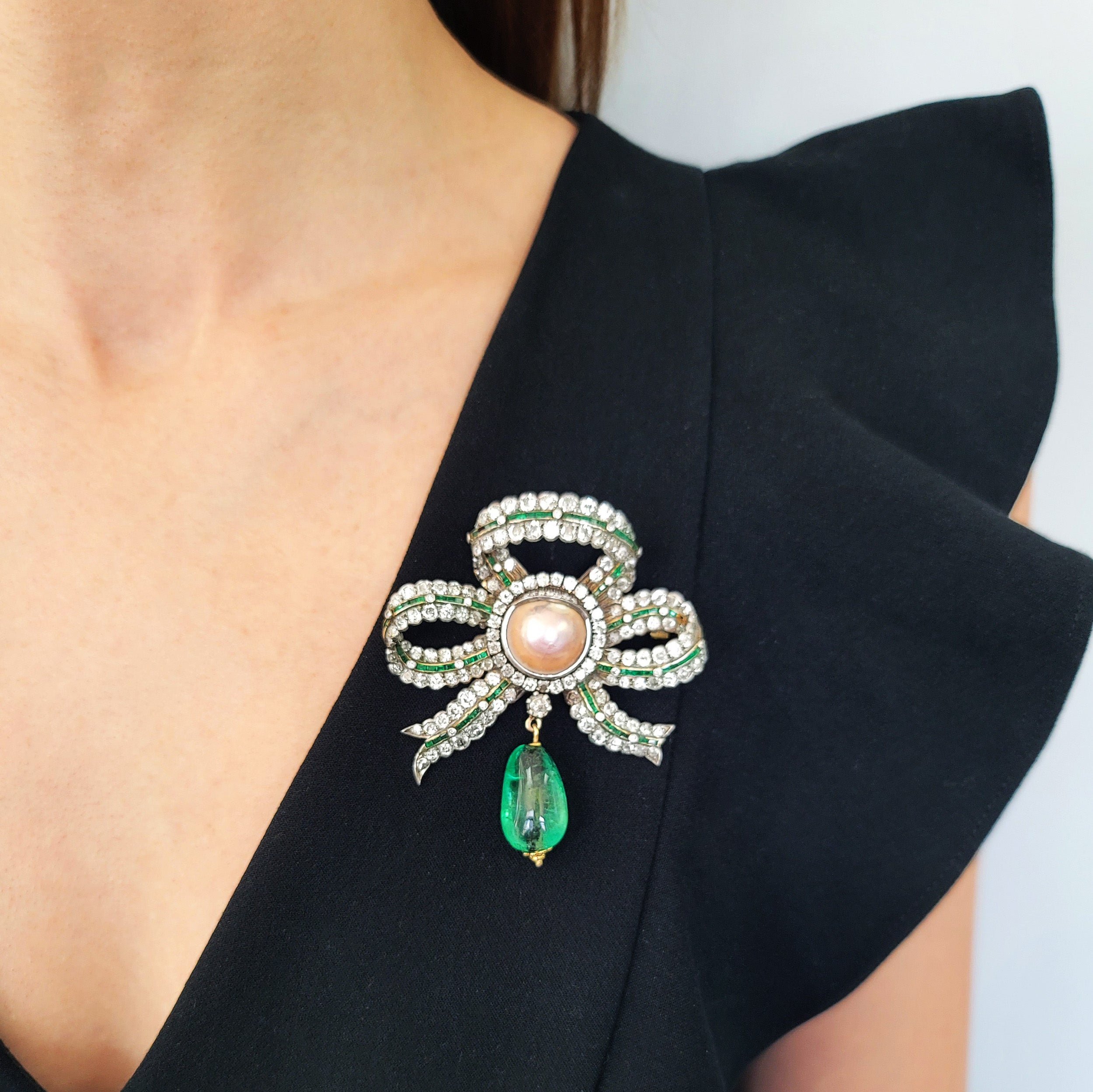 Victorian Emerald, Pearl, And Diamond Bow Brooch In Gold And Platinum