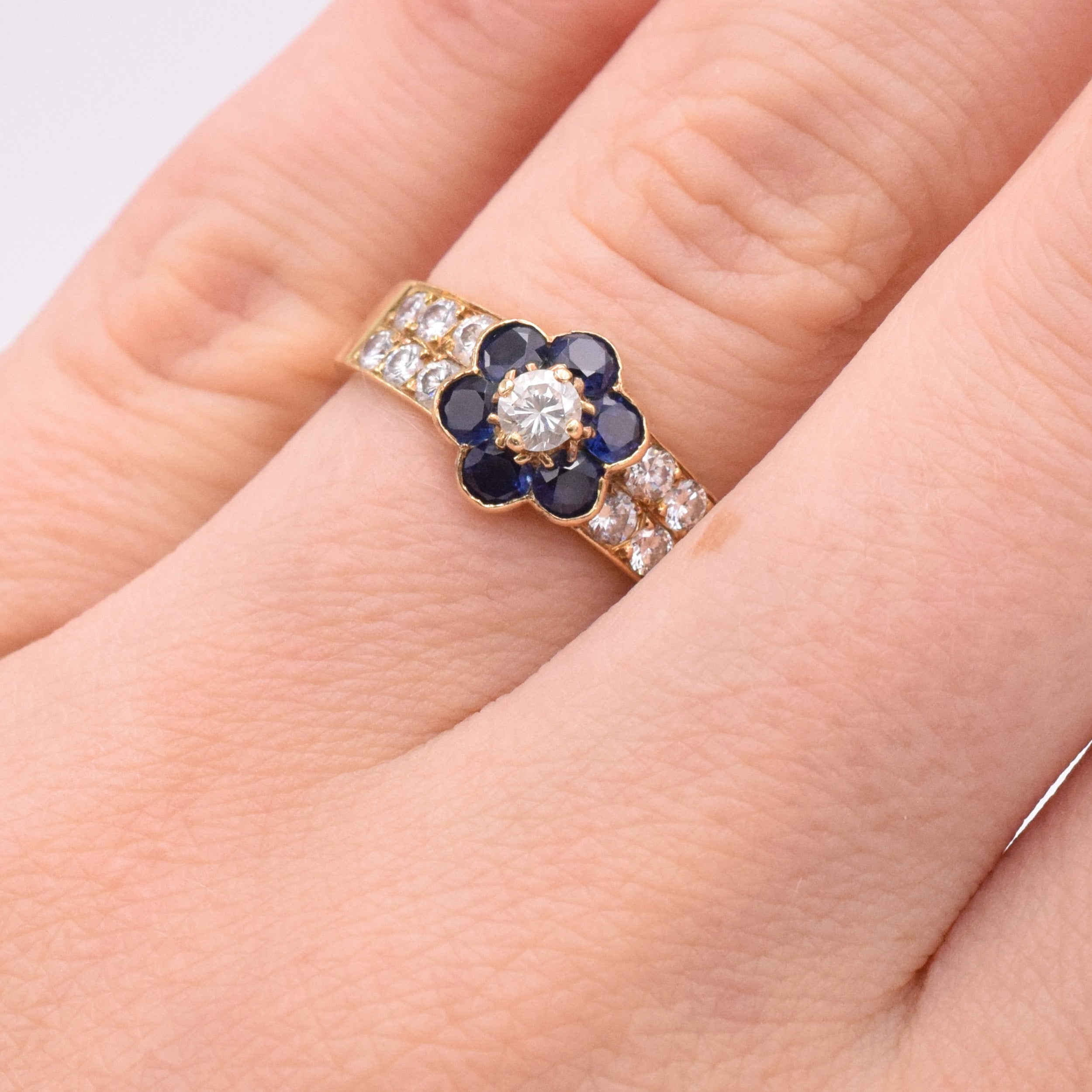 Van Cleef & Arpels Diamond And Sapphire Fleurette Ring In 18k Yellow Gold