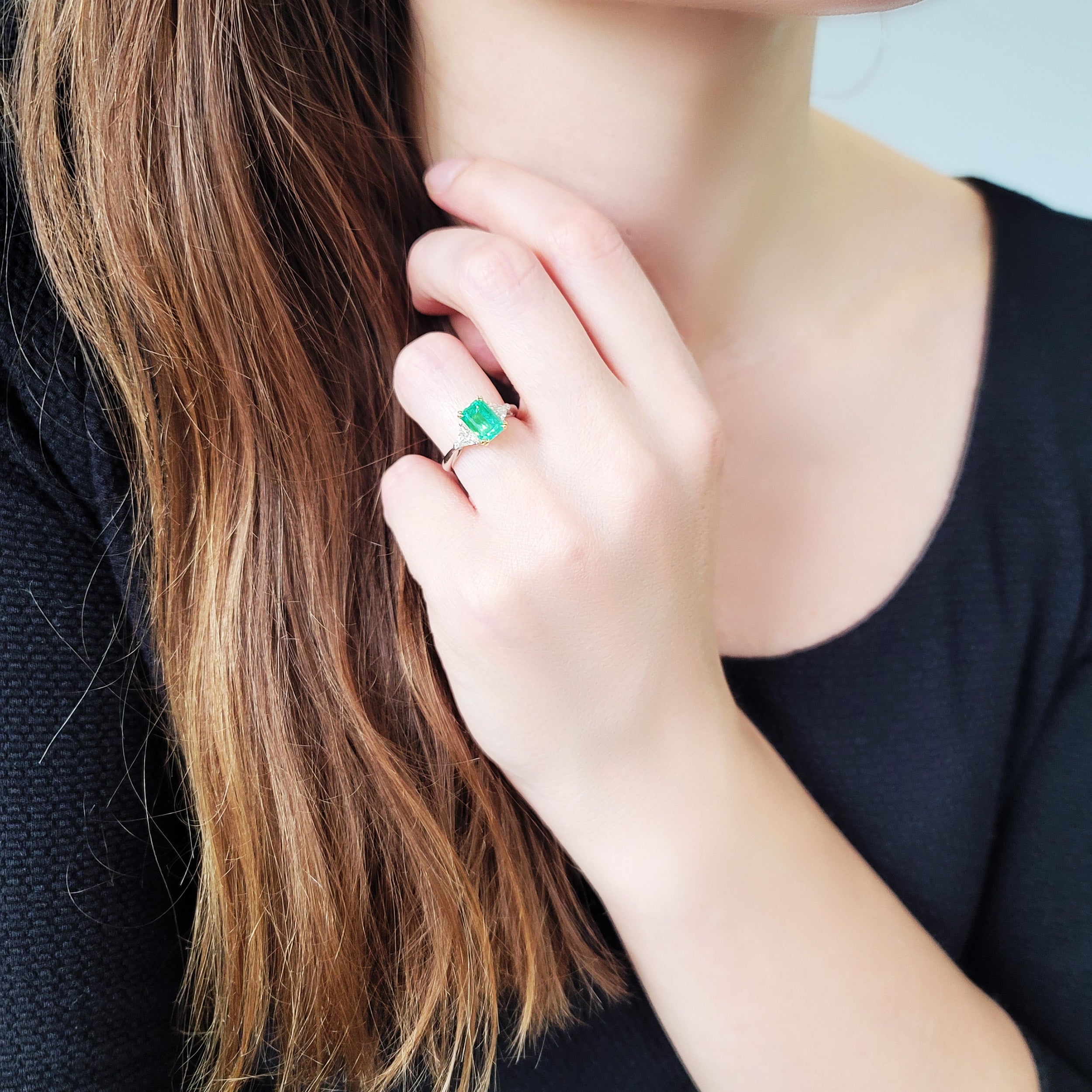 Emerald and diamond ring in platinum and 18k yellow gold.