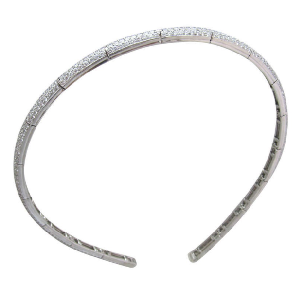 Diamond head band, crafted in 18k white gold, composed of 18 flexible links, pave set with 488 round brilliant cut diamonds. Diamonds total weight approx. 12ct. Color range from G to H Clarity range VS1 to VS2 Weight 27.6g. Width 0.25" Length 12" Ref# 950-000-2010