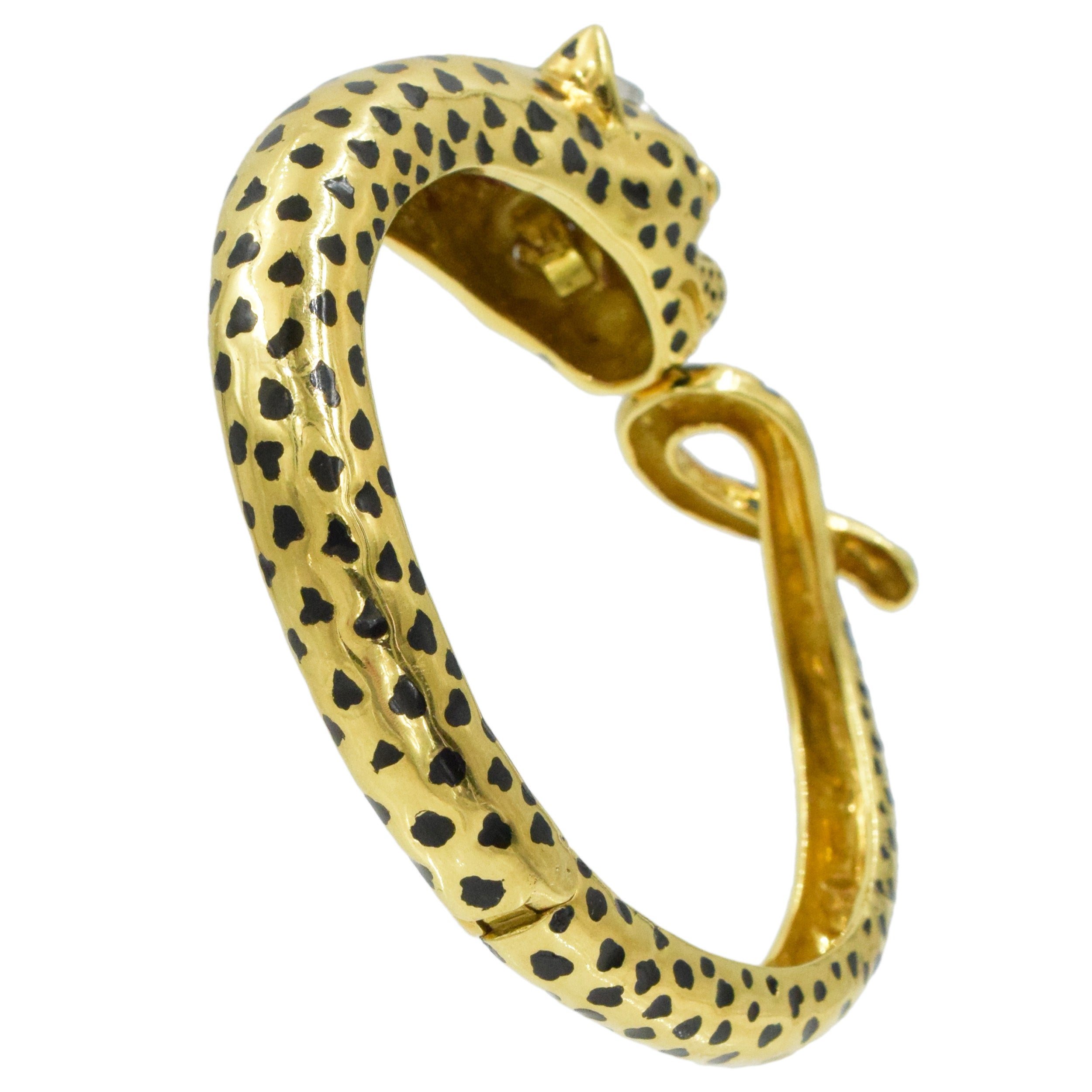 David Webb Diamond, emerald and black enamel Leopard bracelet in 18k yellow gold and platinum.&nbsp;