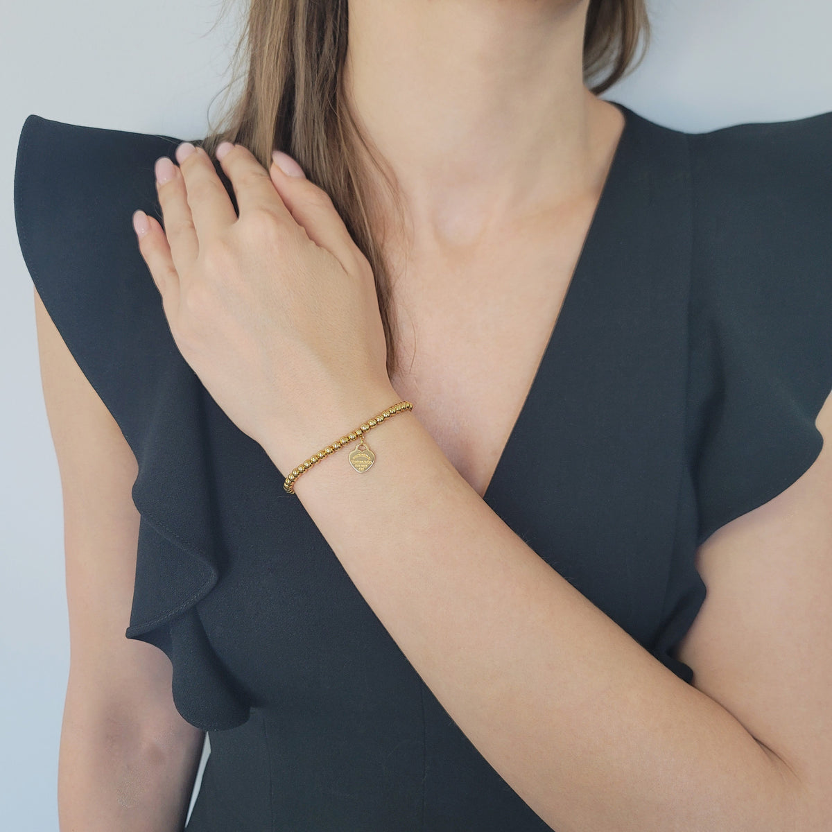 Tiffany & Co. Heart tag bead bracelet in 18k yellow gold