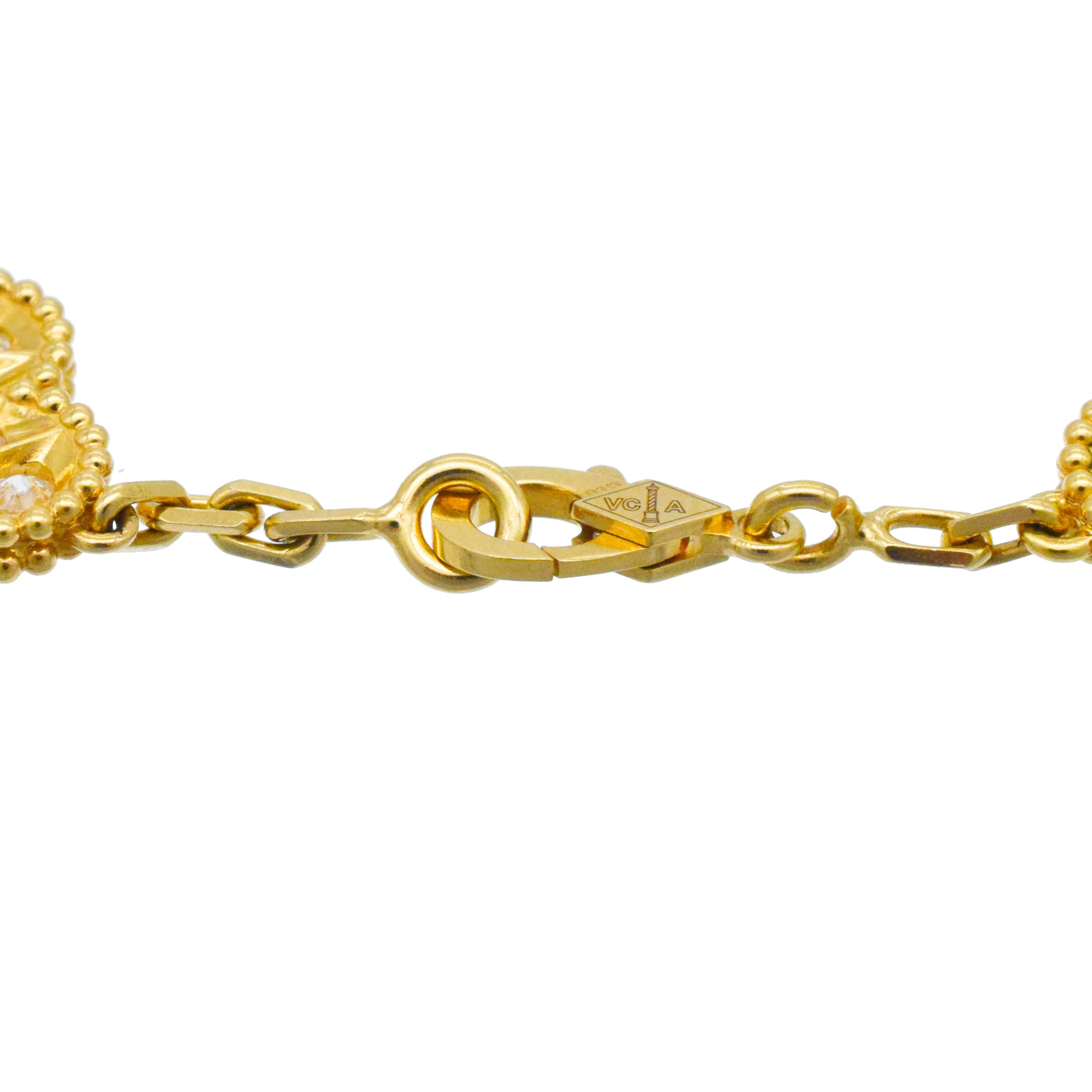 Van Cleef & Arpels diamond and malachite 10-motif Alhambra necklace in 18k yellow gold