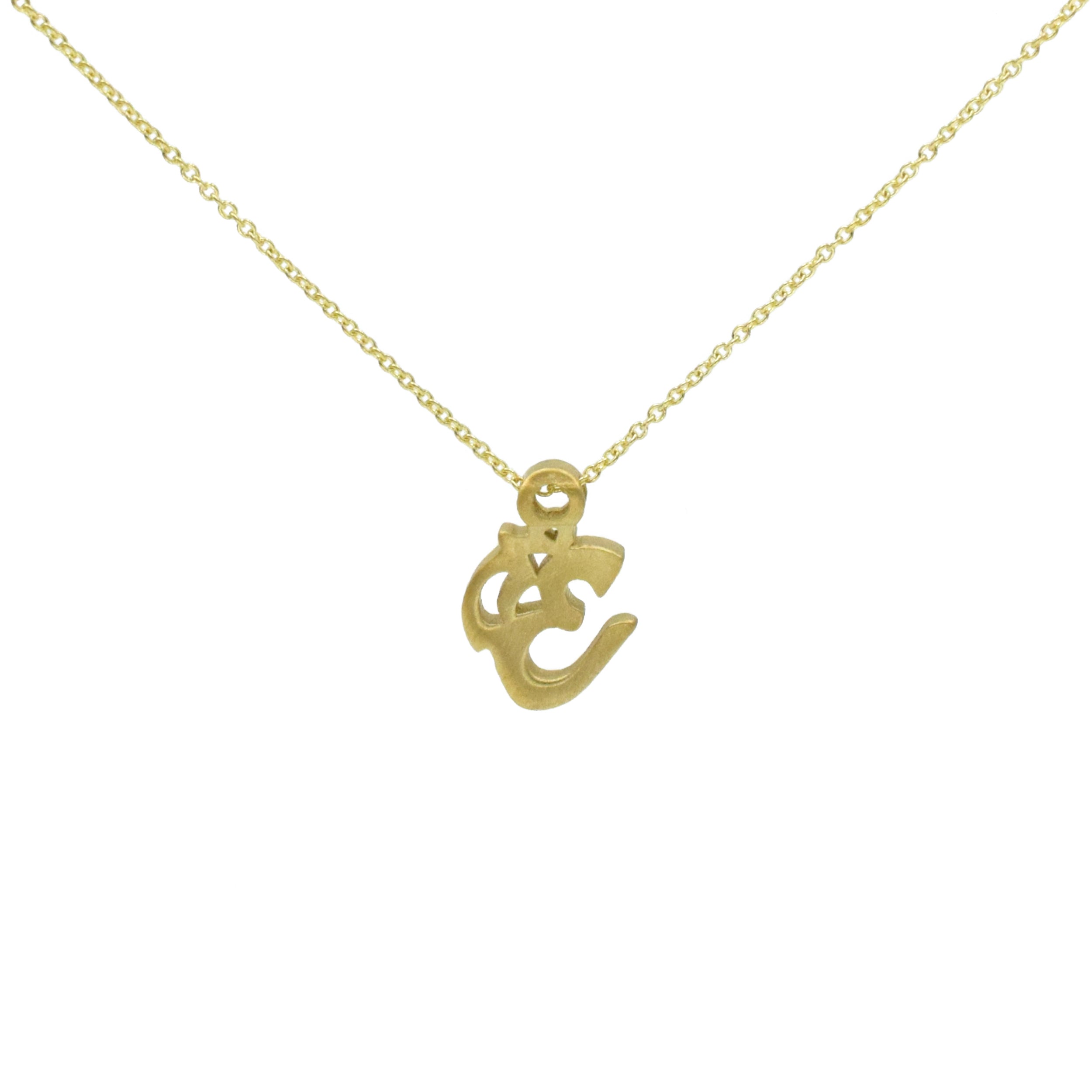 "OM" symbol pendant in 14k yellow gold