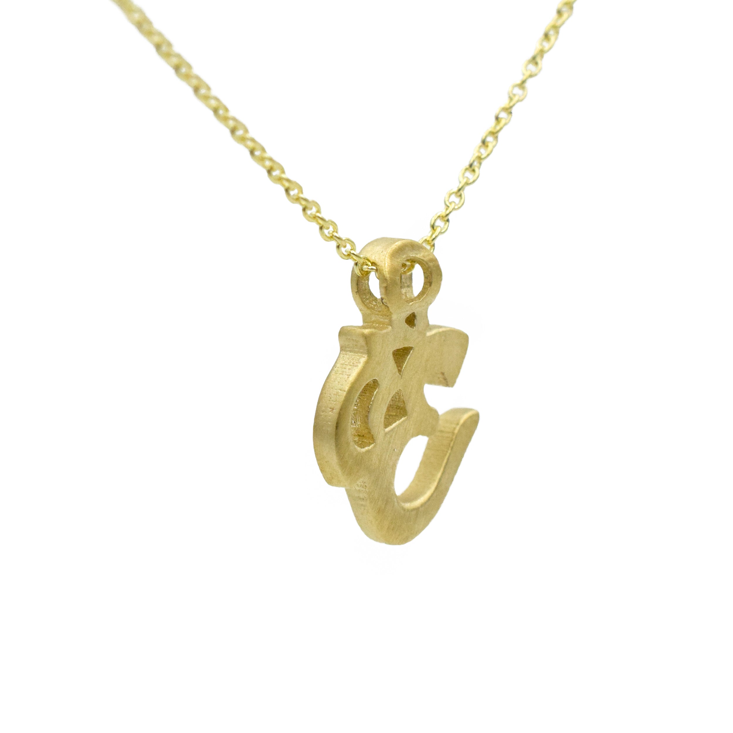 "OM" symbol pendant in 14k yellow gold