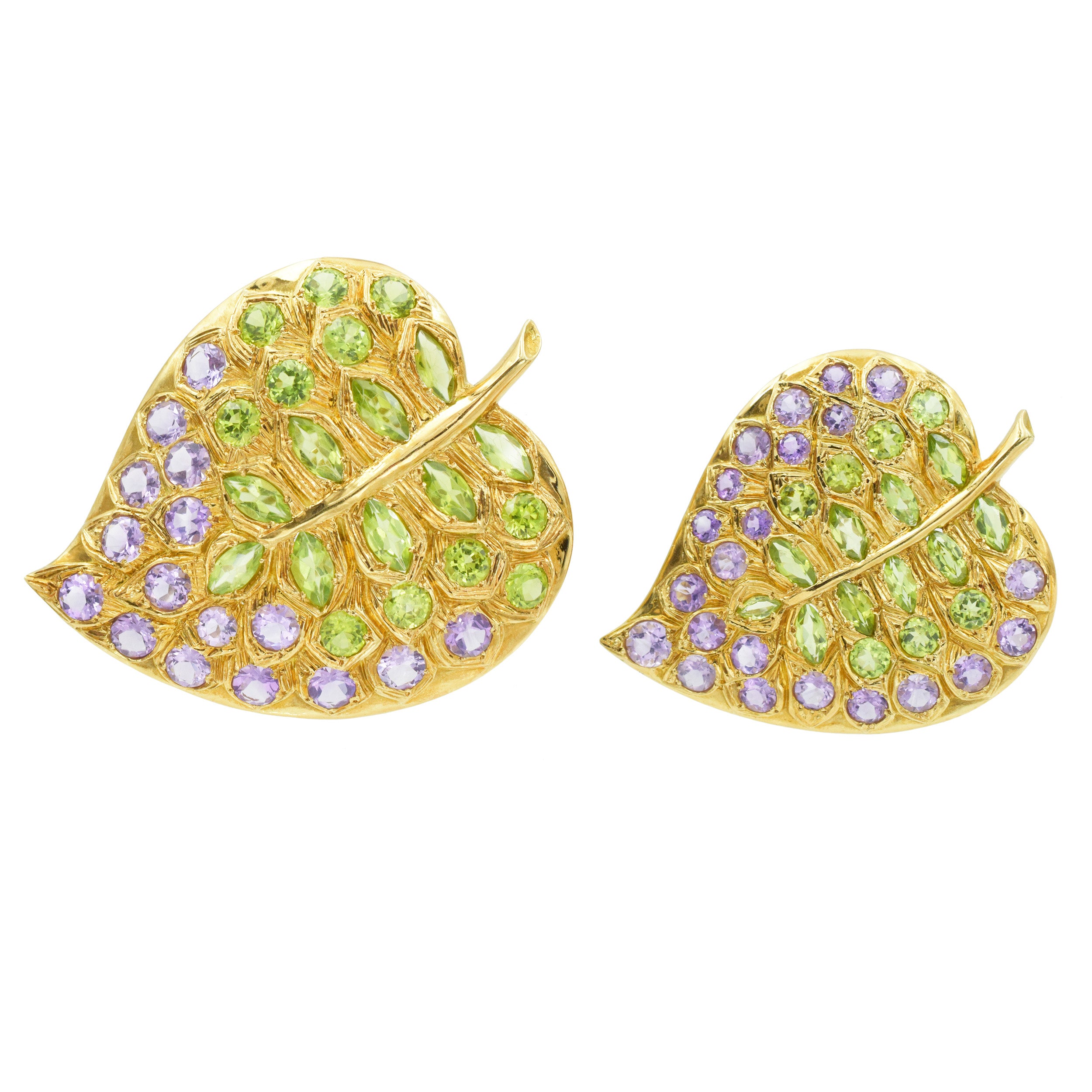 Pair of amethyst and peridot leaf brooches in 18k yellow gold.