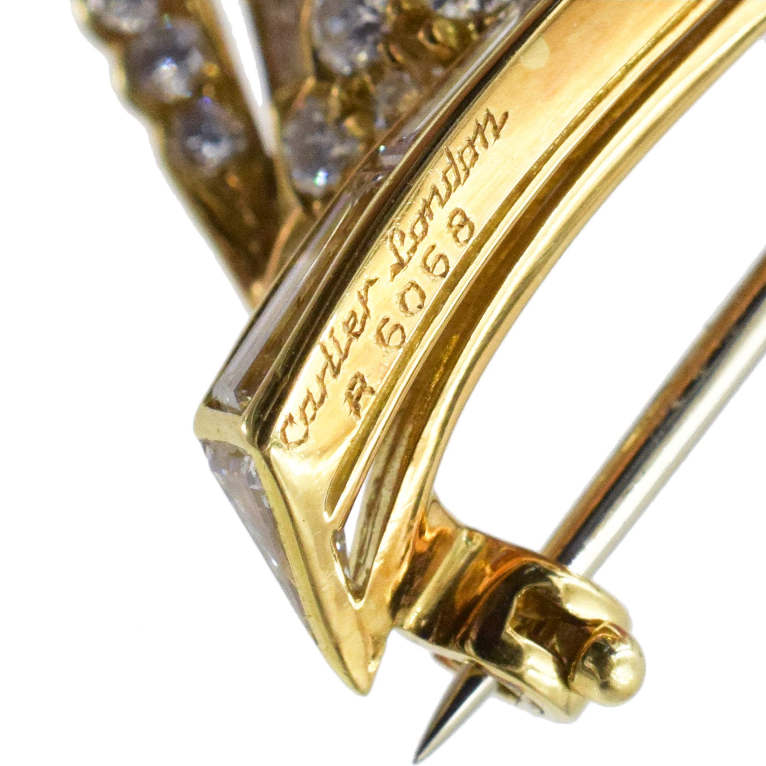 Cartier diamond flower brooch in 18k yellow gold.