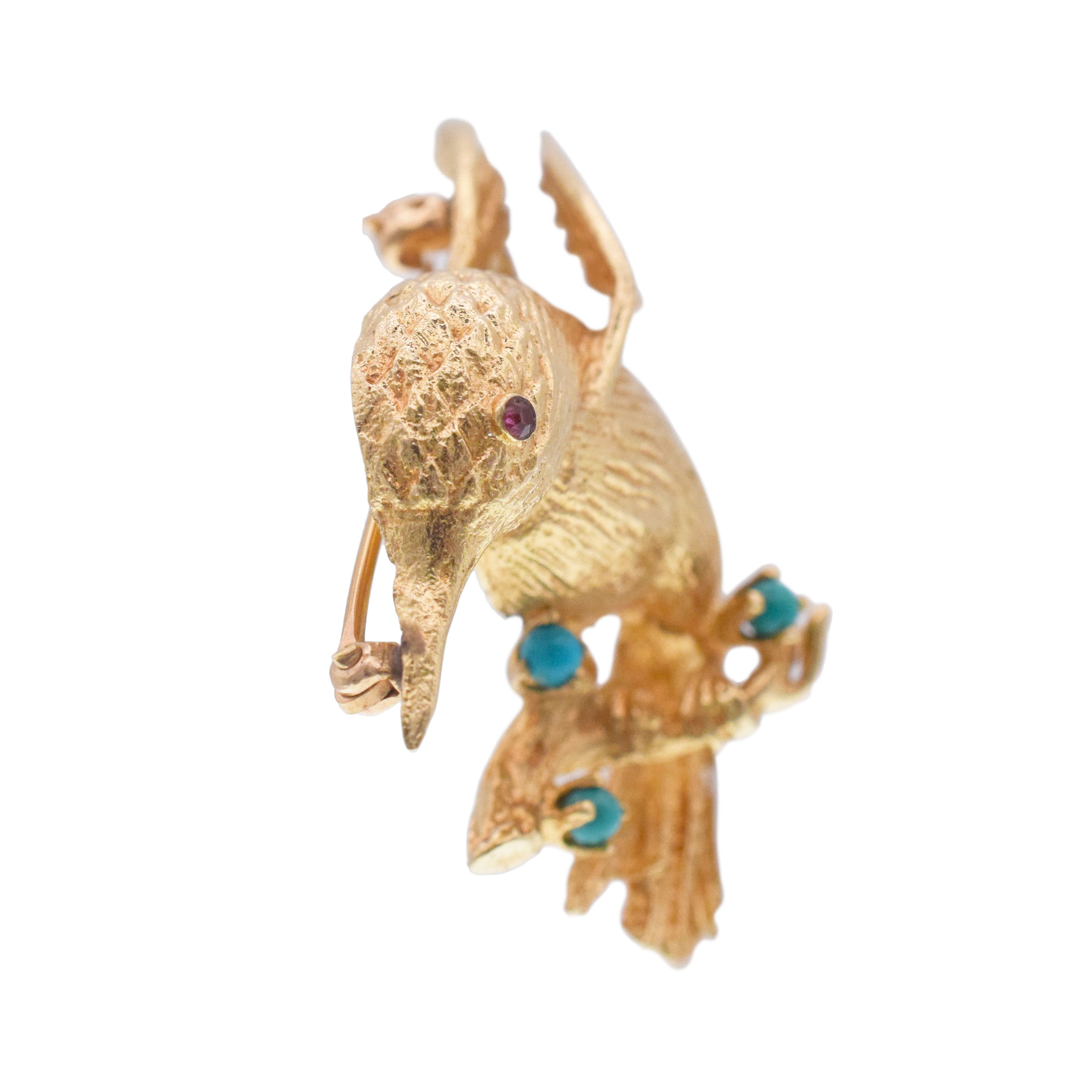 Hummingbird brooch in 12.8k yellow gold with gem accents