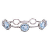 Blue Topaz & Diamond Bracelet in 18k White Gold