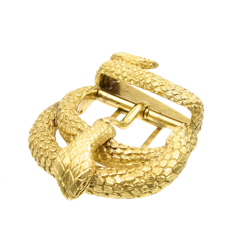 David Webb snake design belt buckle, detailed with snake scale design throughout the piece, crafted in 18k yellow gold.  For the belt width 28 to 30mm.  Measurements: Head Part W: 46mm by L: 45mm Tail Pard W: 36mm by L: 45mm  Signed Webb 18k Weight 51.7g.  Ref# 950-000-242