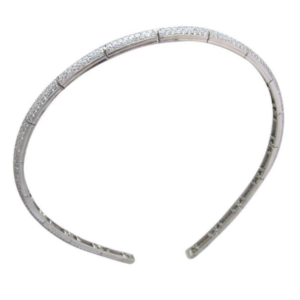 Diamond head band, crafted in 18k white gold, composed of 18 flexible links, pave set with 488 round brilliant cut diamonds.  Diamonds total weight approx. 12ct. Color range from G to H Clarity range VS1 to VS2  Weight 27.6g. Width 0.25" Length 12"  Ref# 950-000-2010